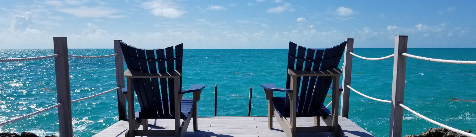 yacht club chairs by water